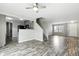 Bright, open-concept living room featuring hardwood-style floors and neutral paint at 1236 N Aberdeen Dr, Franklin, IN 46131