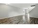 Spacious living area with modern lighting and open staircase at 1236 N Aberdeen Dr, Franklin, IN 46131