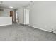 Upstairs loft area with neutral carpet and multiple doorways at 1236 N Aberdeen Dr, Franklin, IN 46131
