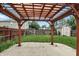 Covered pergola is the perfect place for relaxing and entertaining at 1236 N Aberdeen Dr, Franklin, IN 46131