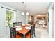 Open dining room view leading to an inviting living room with lots of natural light at 1237 Driftwood Dr, Carmel, IN 46033
