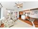 Comfortable living room showcasing a seamless flow to kitchen and outdoor access at 1237 Driftwood Dr, Carmel, IN 46033