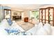 Open concept living and dining area featuring hardwood floors and natural lighting at 1237 Driftwood Dr, Carmel, IN 46033