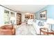 Bright living room featuring a large window, comfortable seating, and stylish decor at 1237 Driftwood Dr, Carmel, IN 46033