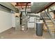 Basement utility area with furnace, water heater, and storage at 136 W Loretta Dr, Indianapolis, IN 46217