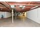 Unfinished basement space with white painted walls and exposed ceiling at 136 W Loretta Dr, Indianapolis, IN 46217