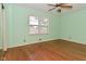 A clean and bright bedroom features a window and ceiling fan at 136 W Loretta Dr, Indianapolis, IN 46217