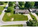 An aerial view of a charming single-story home with a well-manicured lawn at 136 W Loretta Dr, Indianapolis, IN 46217
