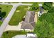 Aerial view shows home with driveway and large green yard at 136 W Loretta Dr, Indianapolis, IN 46217