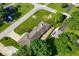 An aerial view shows a home with driveway and large green yard at 136 W Loretta Dr, Indianapolis, IN 46217