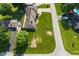 Aerial view shows home with driveway and large green yard at 136 W Loretta Dr, Indianapolis, IN 46217