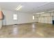 Large garage with concrete floor and windows at 136 W Loretta Dr, Indianapolis, IN 46217
