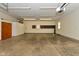 Spacious three-car garage with plenty of room for storage and vehicle parking at 136 W Loretta Dr, Indianapolis, IN 46217