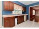 Kitchen view with stainless steel appliances and ample cabinet and counter space at 136 W Loretta Dr, Indianapolis, IN 46217