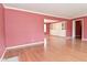 Spacious living area with beautiful hardwood floors and large picture windows at 136 W Loretta Dr, Indianapolis, IN 46217