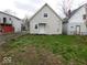 Backyard view of the property featuring a grassy area at 1553 W New York St, Indianapolis, IN 46222