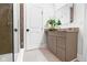 Stylish bathroom featuring a glass shower, earth tone vanity, and modern fixtures at 16512 Grand Cypress Dr, Noblesville, IN 46060