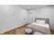 Bright bedroom with hardwood floors, modern decor and natural light at 16512 Grand Cypress Dr, Noblesville, IN 46060