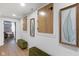 Hallway featuring unique storage, artwork, and seating at 16512 Grand Cypress Dr, Noblesville, IN 46060