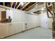 Unfinished basement, showing mechanicals and systems and a door to another room at 16512 Grand Cypress Dr, Noblesville, IN 46060