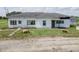 Exterior of a single story home with a covered porch and damaged sections at 17550 N 200 W, Summitville, IN 46070