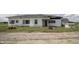 Exterior view of white sided home with lawn at 17550 N 200 W, Summitville, IN 46070