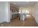 Bright, unfinished kitchen with large center island, and modern gray cabinetry at 1817 Real St, Indianapolis, IN 46240