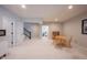 Open basement area, ready for customization, with a staircase and an adjacent storage area at 1872 Wellpark Dr, Westfield, IN 46074