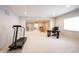 Spacious finished basement featuring neutral walls, carpet, and an exercise area at 1872 Wellpark Dr, Westfield, IN 46074