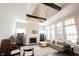 Spacious living room with vaulted ceilings, fireplace, large windows, and comfortable seating at 1872 Wellpark Dr, Westfield, IN 46074