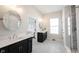 Elegant main bathroom with double vanities and a glass-enclosed shower at 1872 Wellpark Dr, Westfield, IN 46074