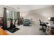 Bright bedroom featuring a comfortable seating area, desk, and large window at 2508 W Sun Valley Pkwy, Muncie, IN 47303