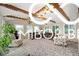 Large sun room with exposed beams, ceiling fan and multiple seating arrangements at 2508 W Sun Valley Pkwy, Muncie, IN 47303