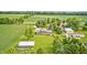 Picture perfect two-story home with large yard and multiple outbuildings at 303 E County Road 500 N, Pittsboro, IN 46167