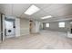 Large finished basement area featuring carpet, laundry area, and access to other rooms at 303 E County Road 500 N, Pittsboro, IN 46167