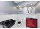 Bathroom featuring a stylist red vanity and black stylist sink at 303 E County Road 500 N, Pittsboro, IN 46167