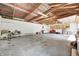 Large garage with workbench and storage is perfect for projects and parking at 303 E County Road 500 N, Pittsboro, IN 46167