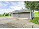Additional two-car garage on a concrete pad, great for storing equipment at 303 E County Road 500 N, Pittsboro, IN 46167