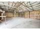 Large shed with an open interior, perfect for storage or workshop with exposed ceiling at 303 E County Road 500 N, Pittsboro, IN 46167