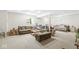 Spacious basement with carpet, neutral walls, a comfortable seating area, and a daybed at 360 Myers Lake Dr, Noblesville, IN 46062