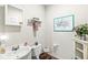 Cozy bathroom featuring a pedestal sink, decorative accents, and a quaint, inviting atmosphere at 360 Myers Lake Dr, Noblesville, IN 46062