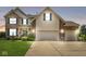 Two-story home featuring brick accents, neutral siding, and a three-car attached garage at 360 Myers Lake Dr, Noblesville, IN 46062