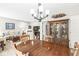 Open-concept living area and dining room with fireplace and comfortable seating at 360 Myers Lake Dr, Noblesville, IN 46062