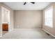 Bright bedroom with neutral walls, carpet, and a window for natural light at 3720 Abney Highland Dr, Zionsville, IN 46077