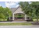 Charming stone gazebo in a community park with seating, lighting, and lovely landscaping at 3720 Abney Highland Dr, Zionsville, IN 46077