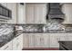 Well-equipped kitchen features granite countertops, backsplash, and updated appliances at 3720 Abney Highland Dr, Zionsville, IN 46077