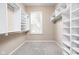 Spacious walk-in closet featuring built-in shelving at 3720 Abney Highland Dr, Zionsville, IN 46077