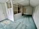 Partially finished attic with carpet, exposed beams, and a walk-in closet at 388 N Ohio St, Martinsville, IN 46151