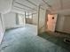 Finished attic space with sloped ceilings, partial framing, and access to a bathroom at 388 N Ohio St, Martinsville, IN 46151