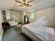 Bedroom with a staircase, storage, and a window overlooking the outdoor scenery at 388 N Ohio St, Martinsville, IN 46151